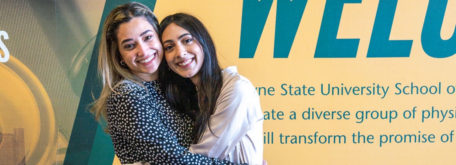 Female medical students smiling